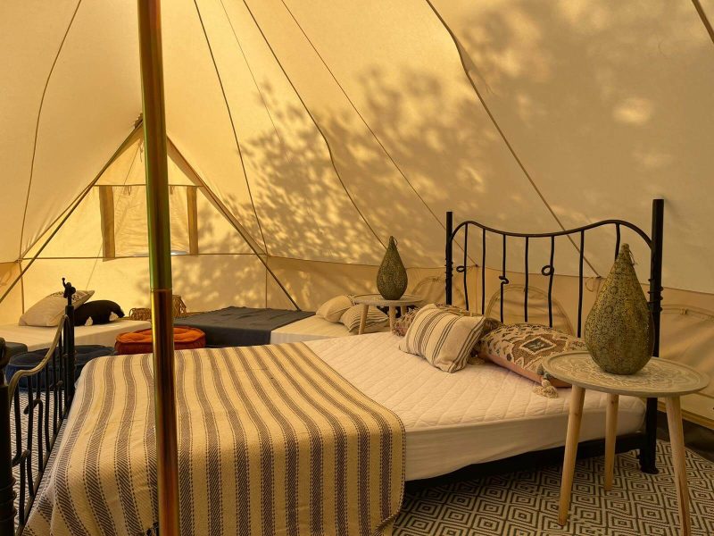 Beds inside the glamping canvas tent